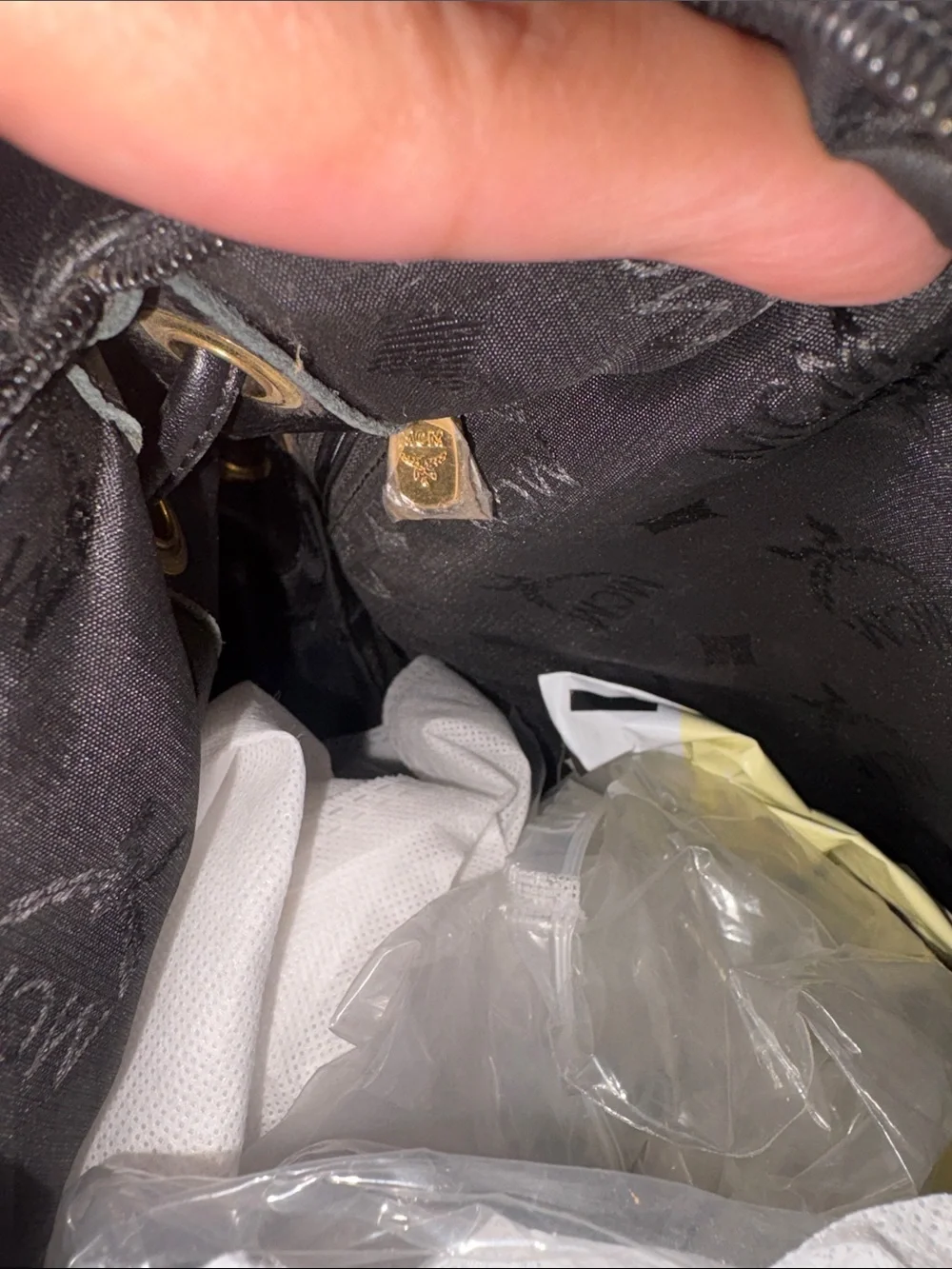 MCM Black Quilted Leather Backpack with Gold Accents